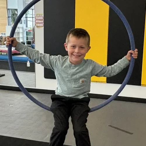 Young student using a swing at an Edmonton Preschool